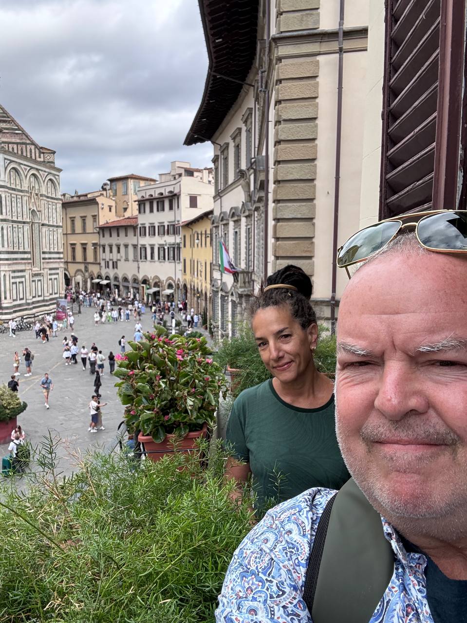 John and Elli smile for a selfie in Italy
