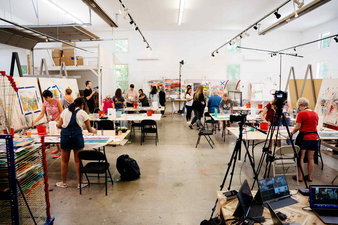 A studio full of artists working