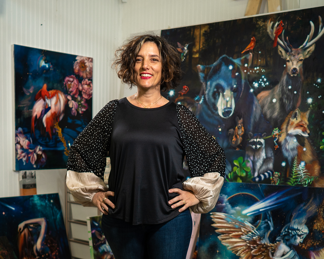 Artist Influencer Elli Milan standing tall and proud in her art studio
