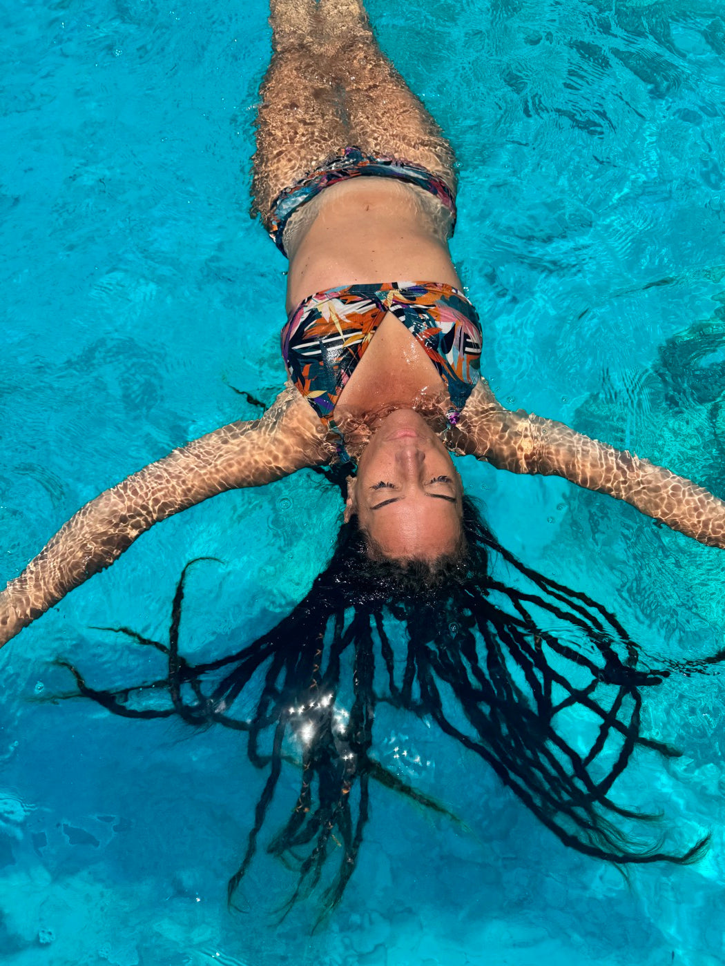 Elli Milan floating in the sea off Zakynthos, an Ionian island near Ithaka